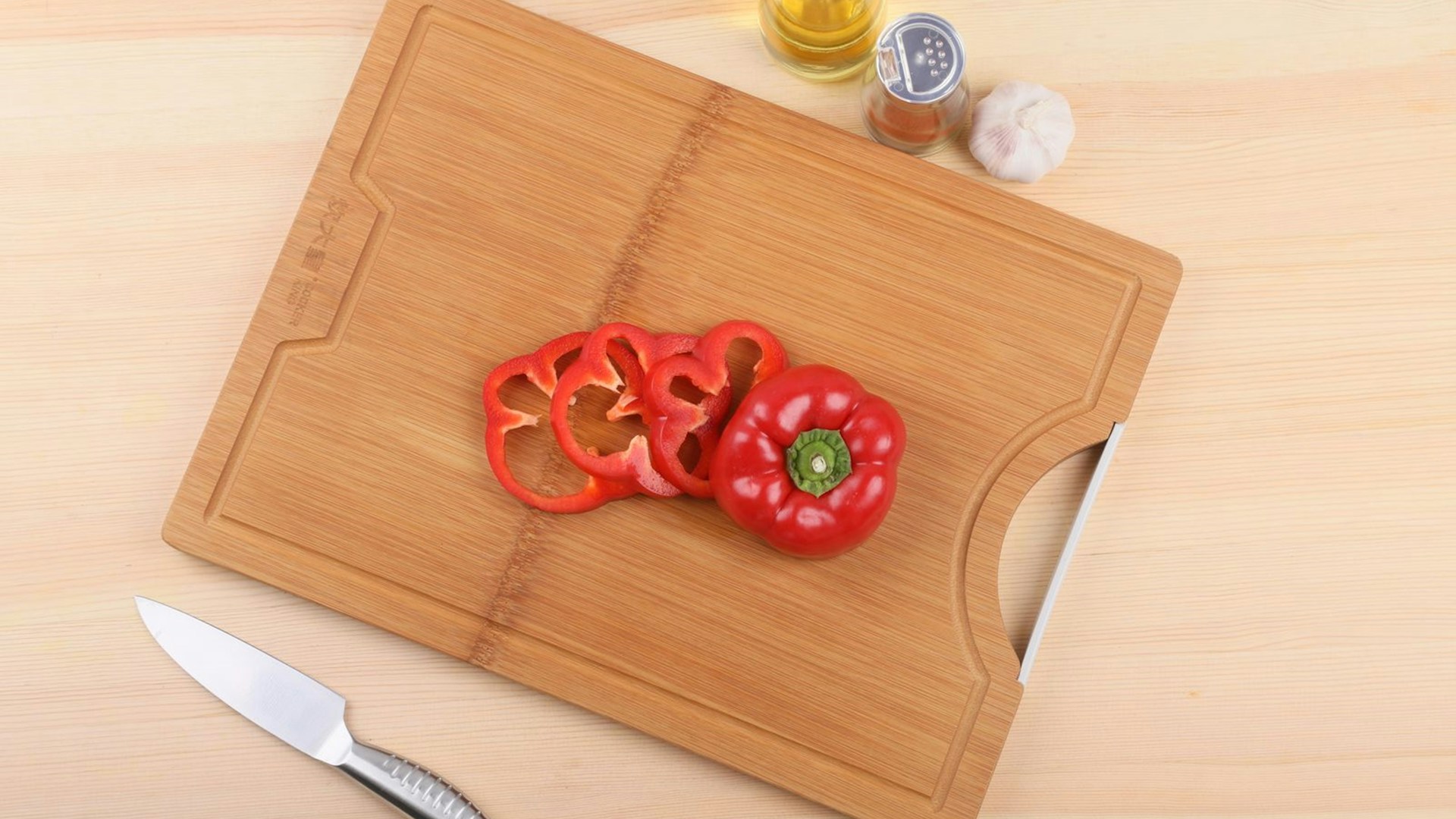 red chili pepper on brown wooden chopping board