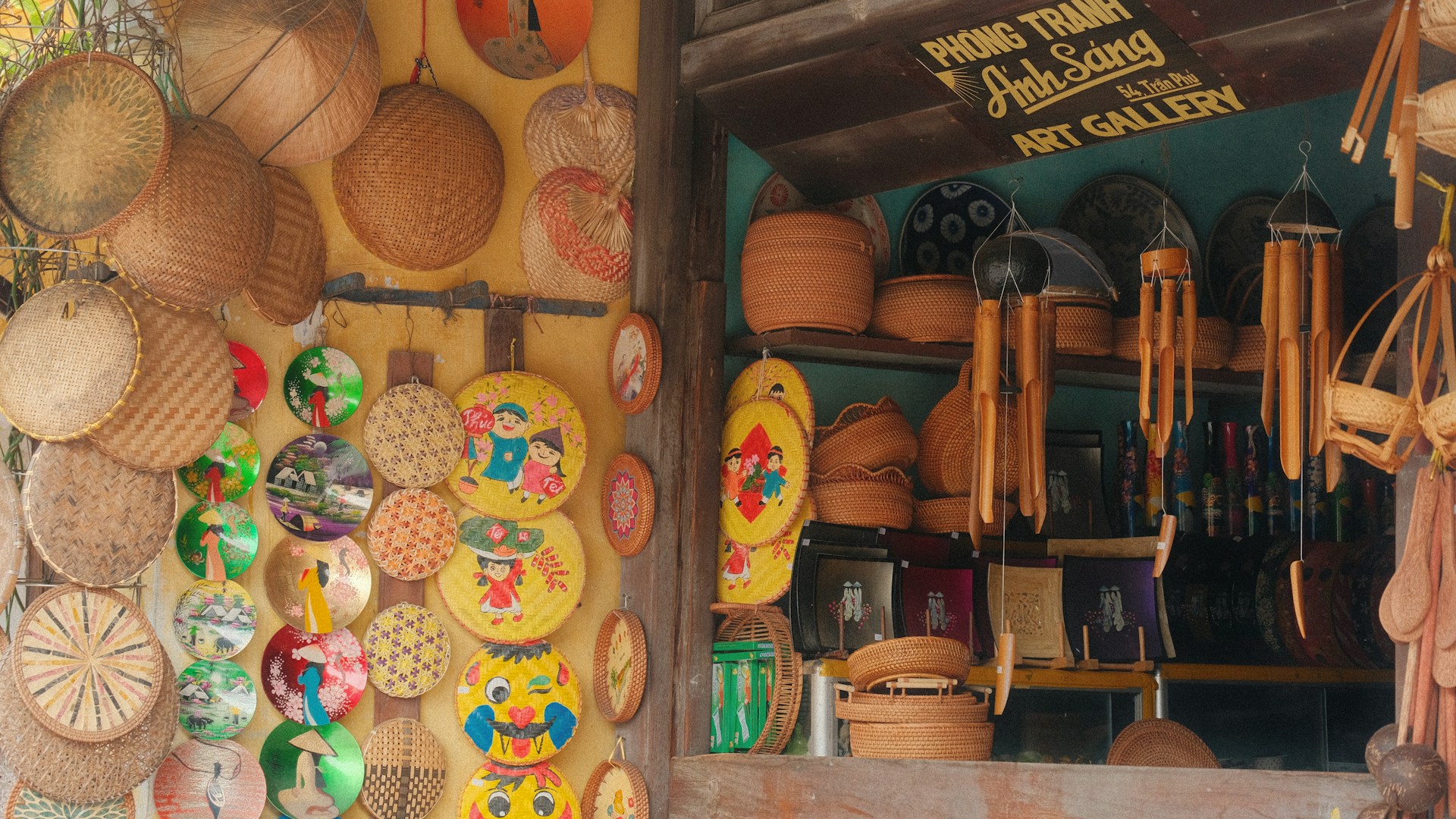 Woven baskets and decorative items displayed outside a shop.