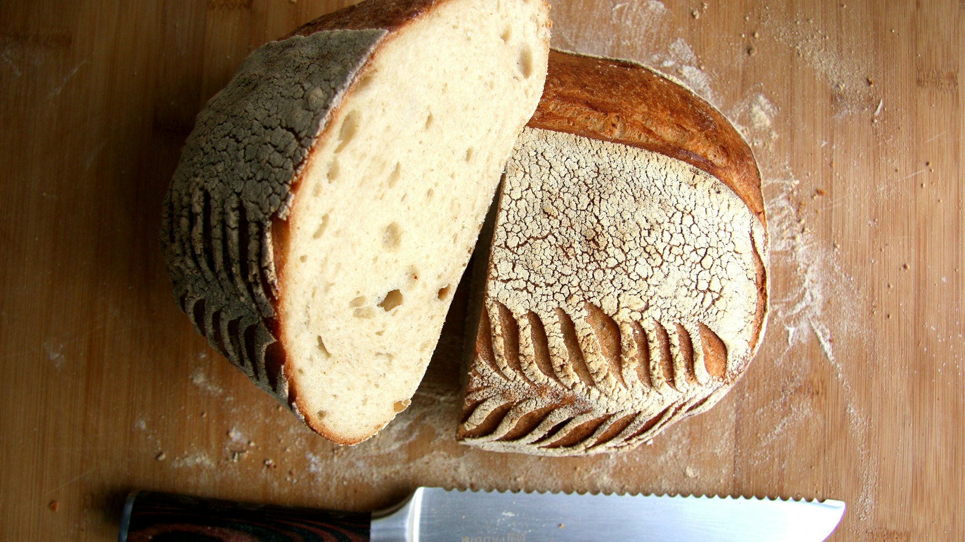 sliced bread on brown wooden chopping board