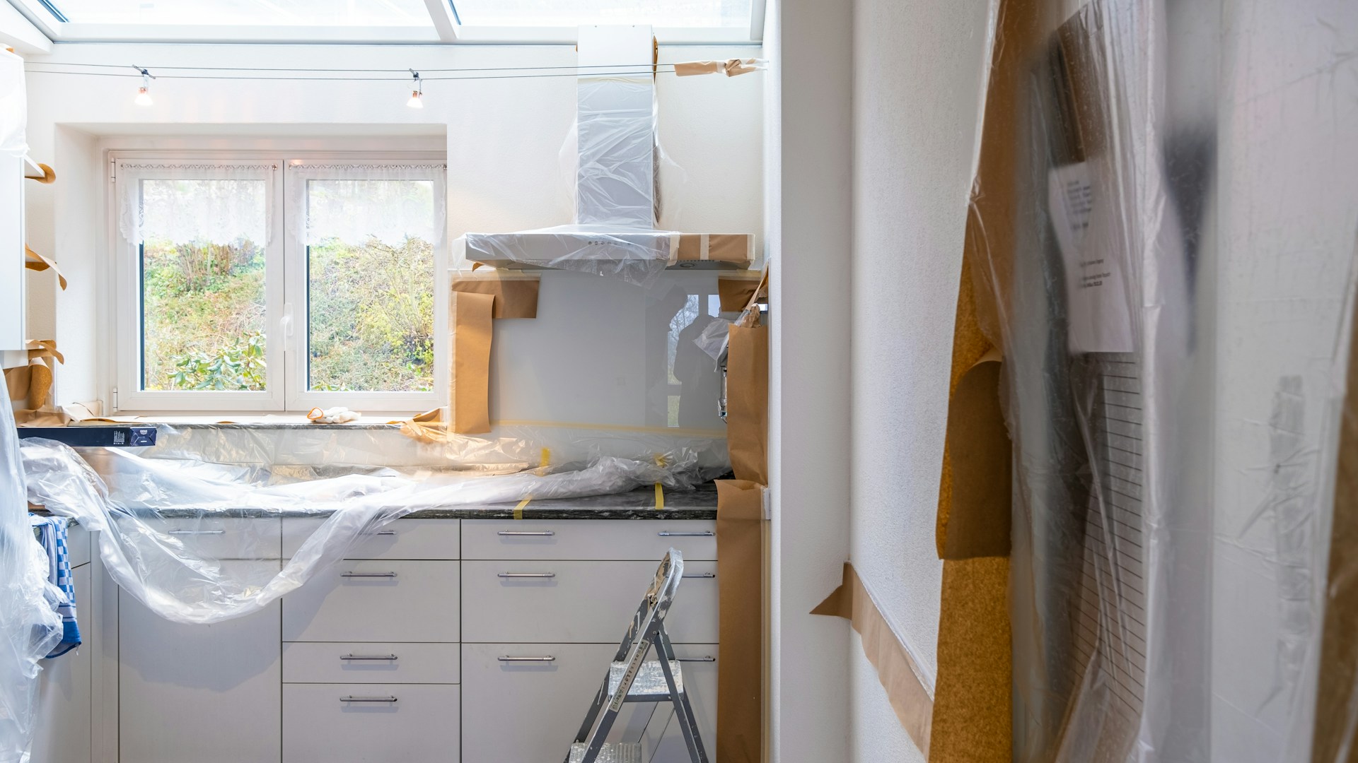 white wooden cabinet near window