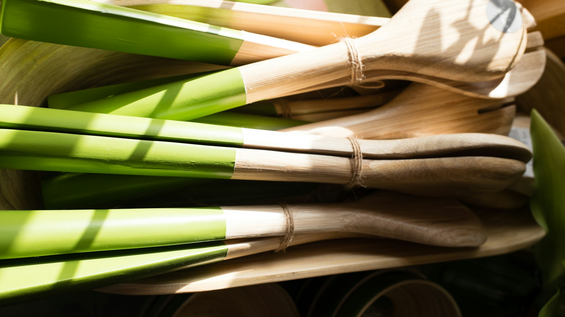 Wooden salad servers with green painted handles