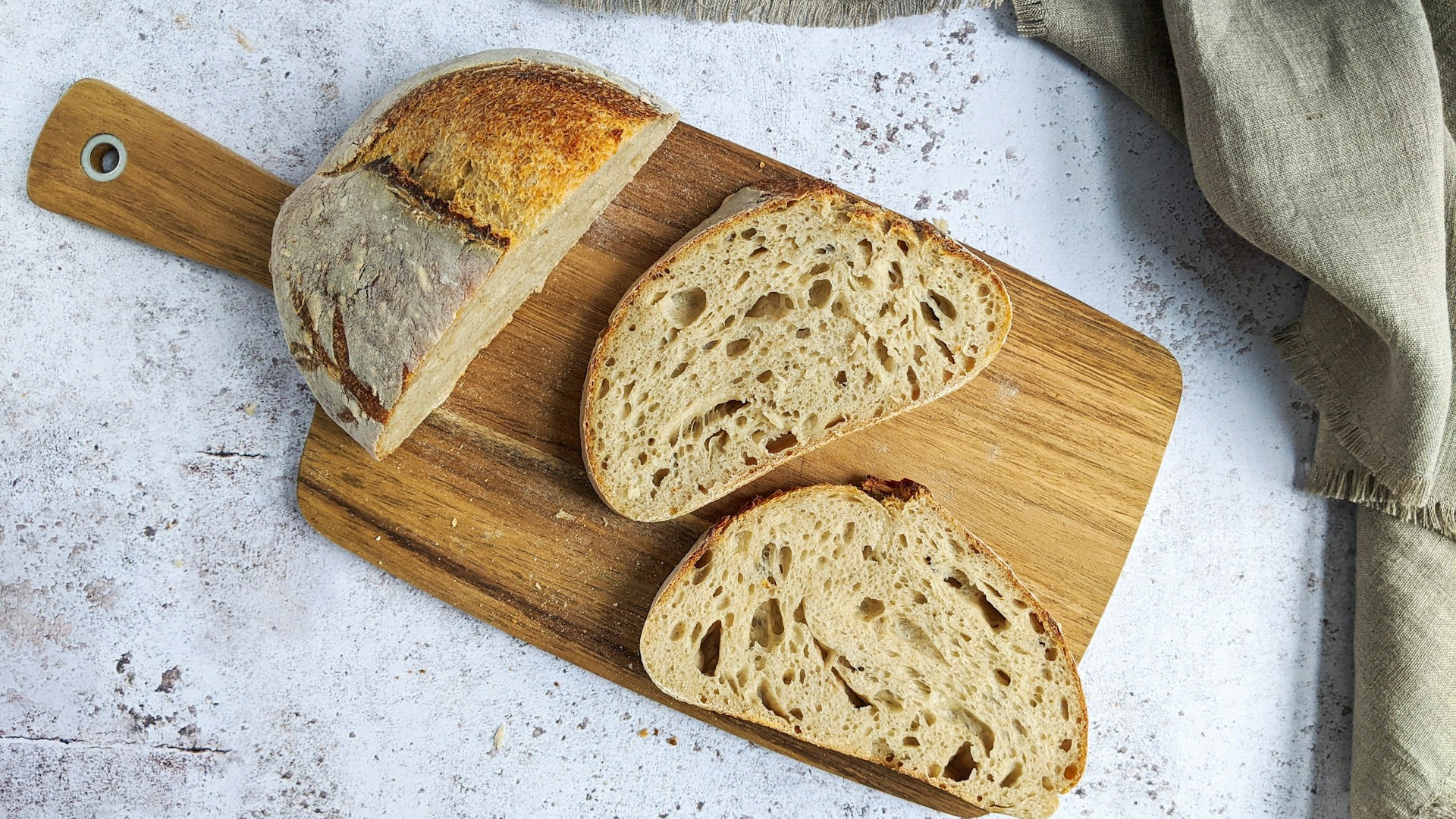 brown bread on brown wooden chopping board